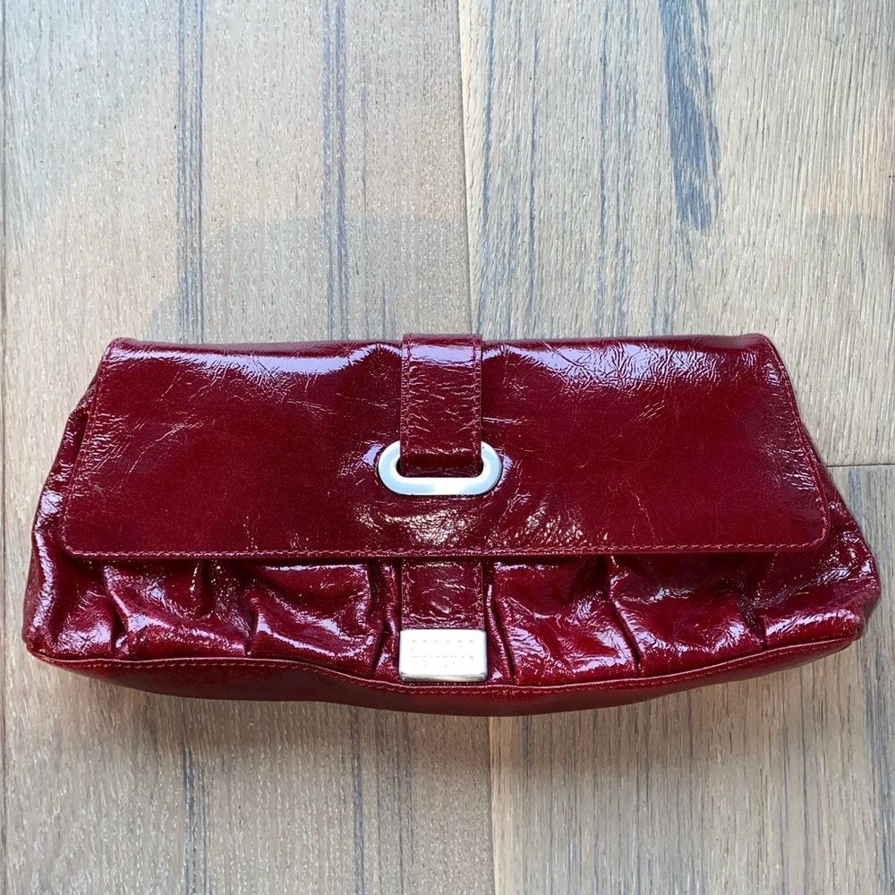 Stuart Weitzman red patent leather clutch